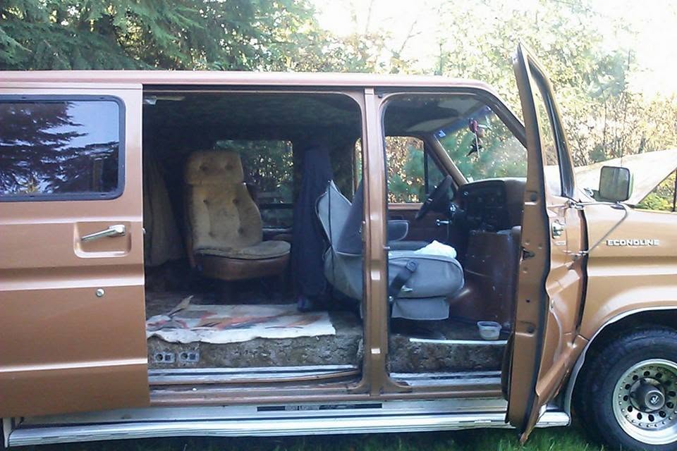 My van with its sliding door open, showing the living space inside ... my home during part of the Letucia rebuild